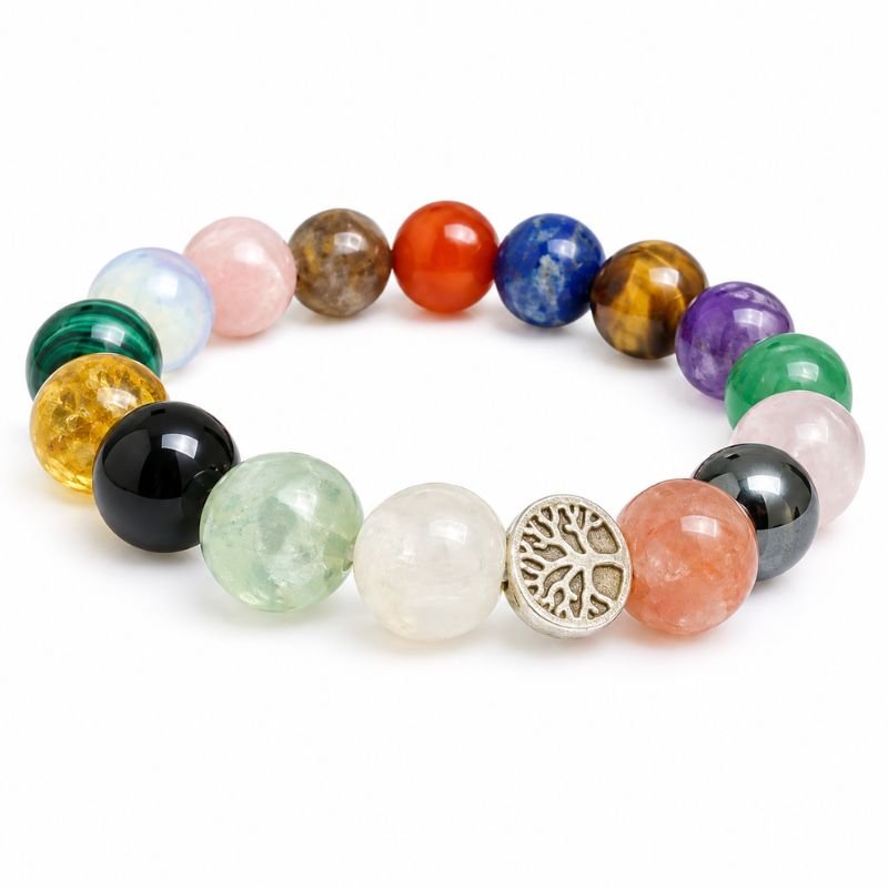Multistone 7 Chakra Bracelet featuring natural chakra gemstones and a Tree of Life charm on a stretch bracelet