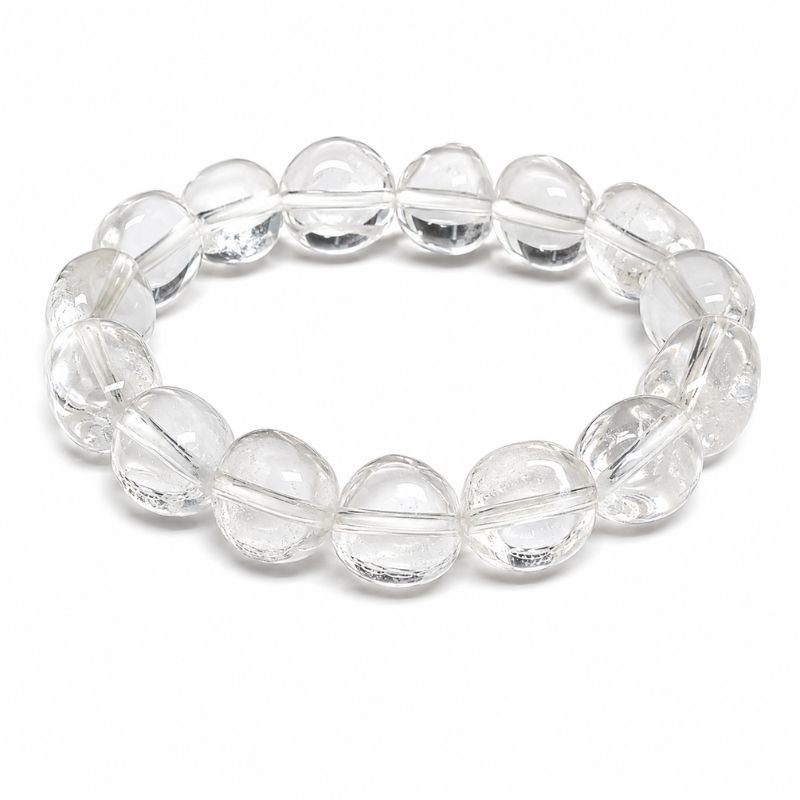 Clear Quartz Tumble Stone Bracelet made with natural Clear Quartz crystals for clarity, positive energy, mindfulness, and energy amplification.