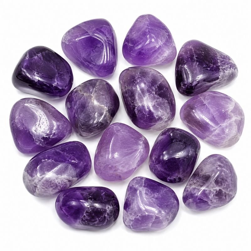 Natural polished Amethyst Tumble Stone with rich purple color and smooth finish on a white background