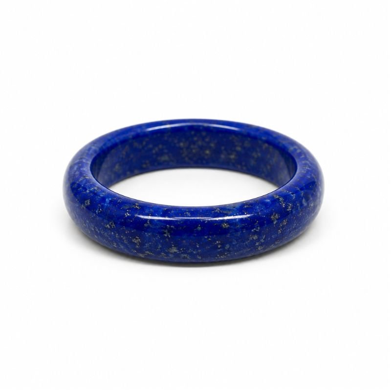 Natural Lapis Lazuli Band Ring with deep royal blue gemstone and golden pyrite flecks polished in a smooth band design
